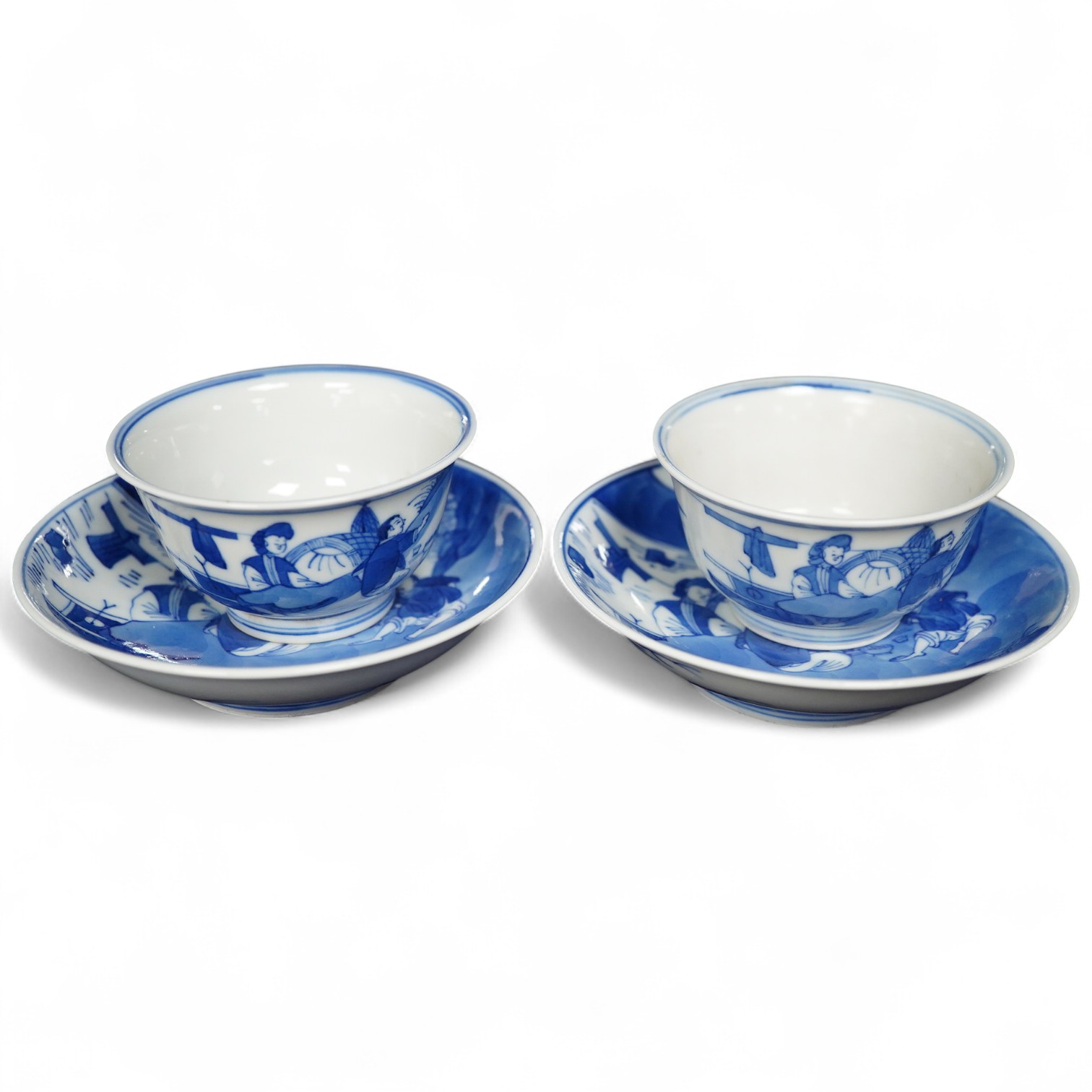 Two Chinese blue and white tea bowls and saucers, saucer 11.5cm diameter.